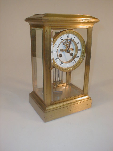 Appraisal: An early thC French gilt metal four glass mantel clock