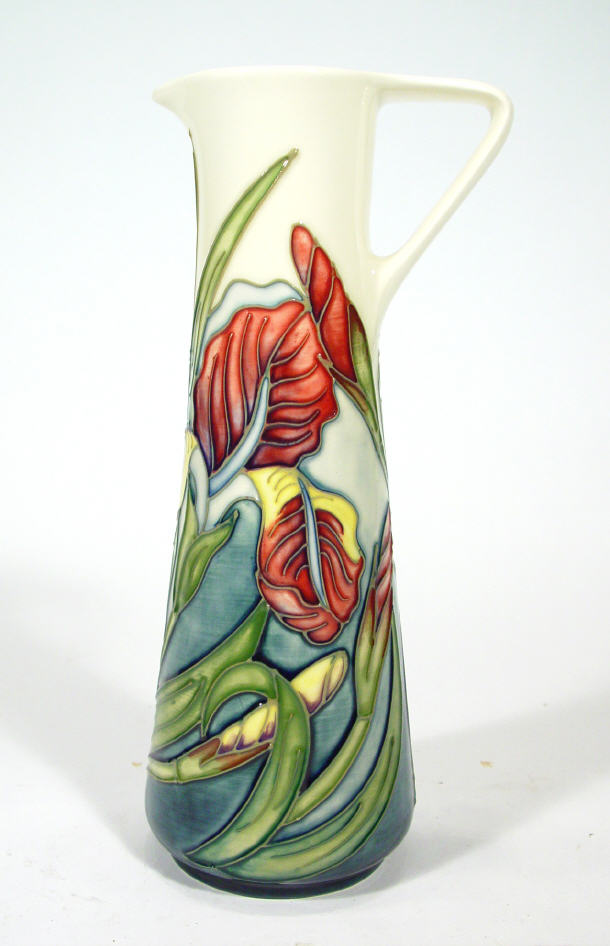 Appraisal: Moorcroft pottery jug hand painted and tubelined with flowers and