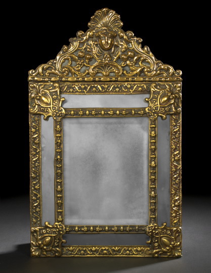 Appraisal: Dutch Embossed Gilded Brass and Mirrored Glass Looking Glass fourth