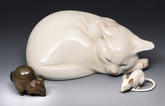 Appraisal: A ROYAL COPENHAGEN WHITE GLAZED PORCELAIN MODEL of a sleeping