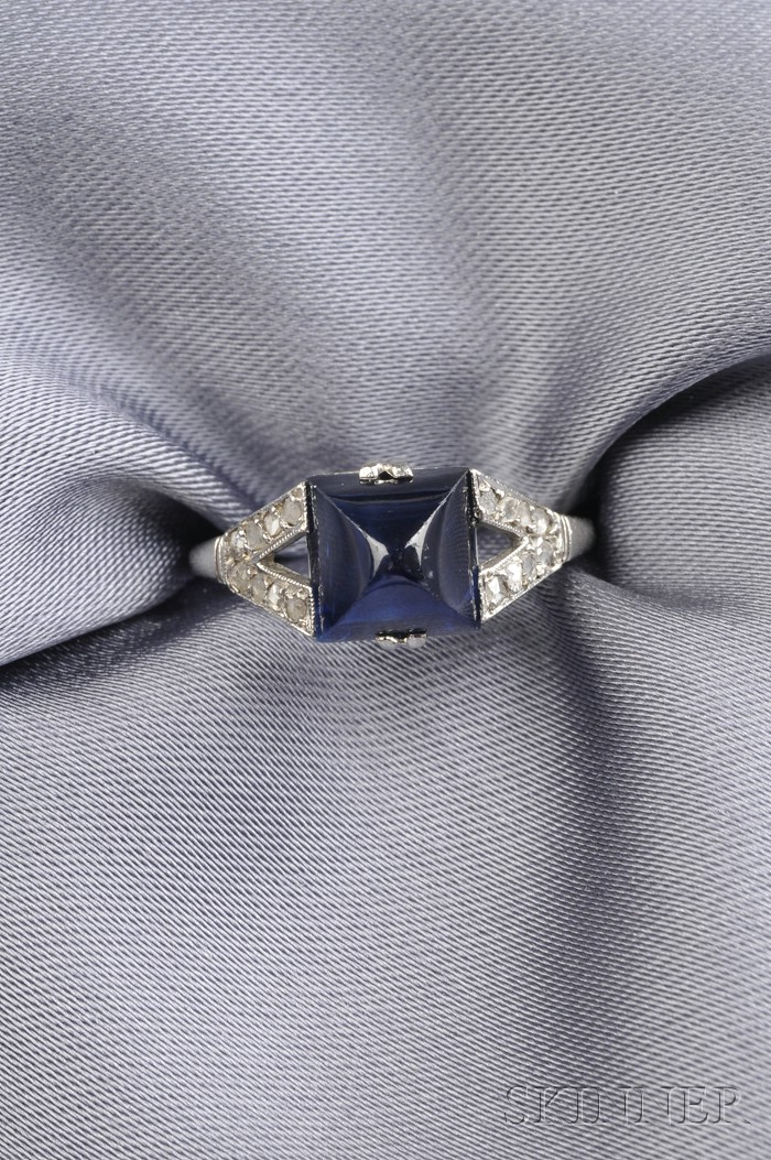 Appraisal: Platinum Sapphire and Diamond Ring set with a sugarloaf sapphire