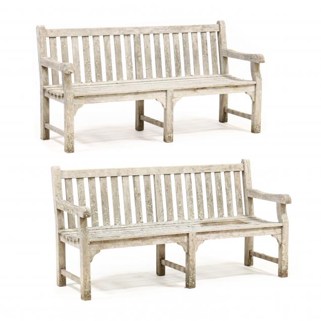 Appraisal: PAIR OF TEAK GARDEN BENCHES Late th century slat form