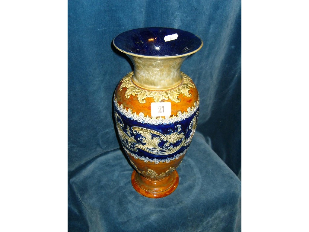 Appraisal: A large Doulton Lambeth vase with relief scrolling and stylised