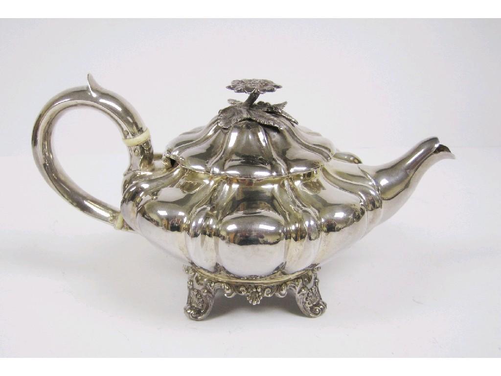 Appraisal: A Victorian melon shape Teapot with flower finial scallop and