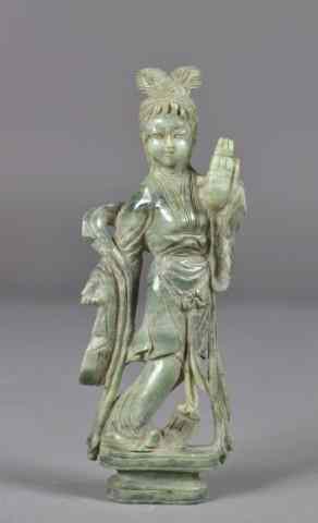 Appraisal: Chinese Carved Jade FigurineCarved to depict a standing beauty holding