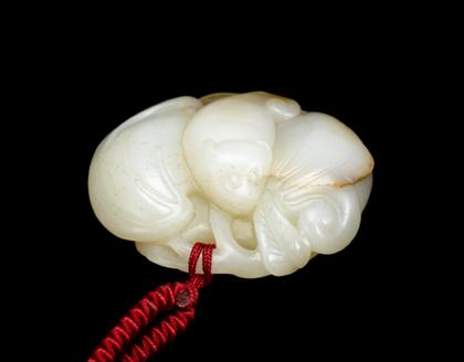 Appraisal: Chinese celadon jade 'bat and peach' pendant yuan ming dynasty