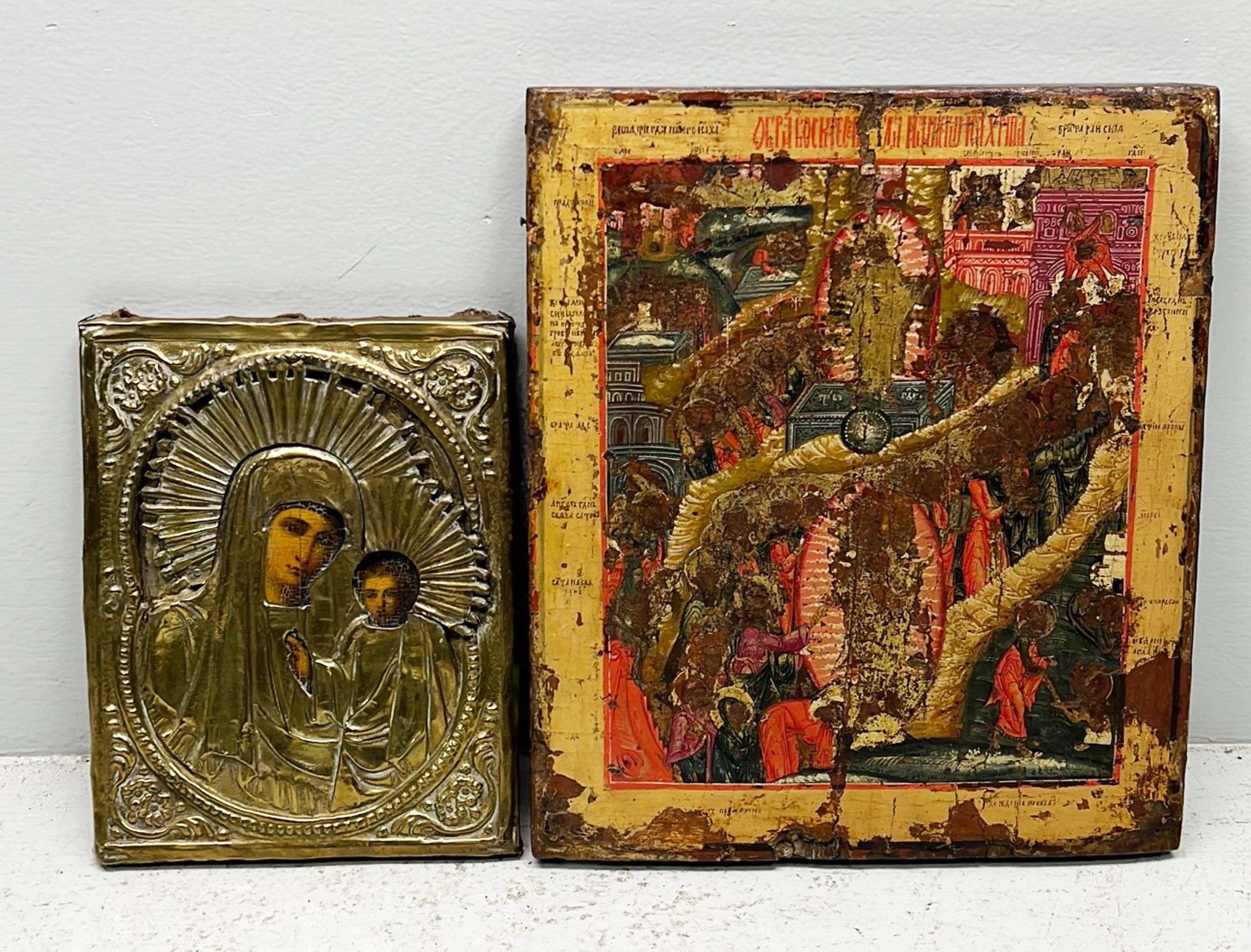 Appraisal: Russian Orthodox icon paintingsLarger measures x Losses to paint crack