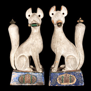 Appraisal: A Pair of Painted Wood -Inari Foxes TH TH CENTURY