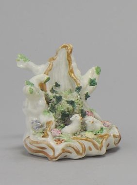 Appraisal: STAFFORDSHIRE FIGURE GROUP Circa In the form of two recumbent