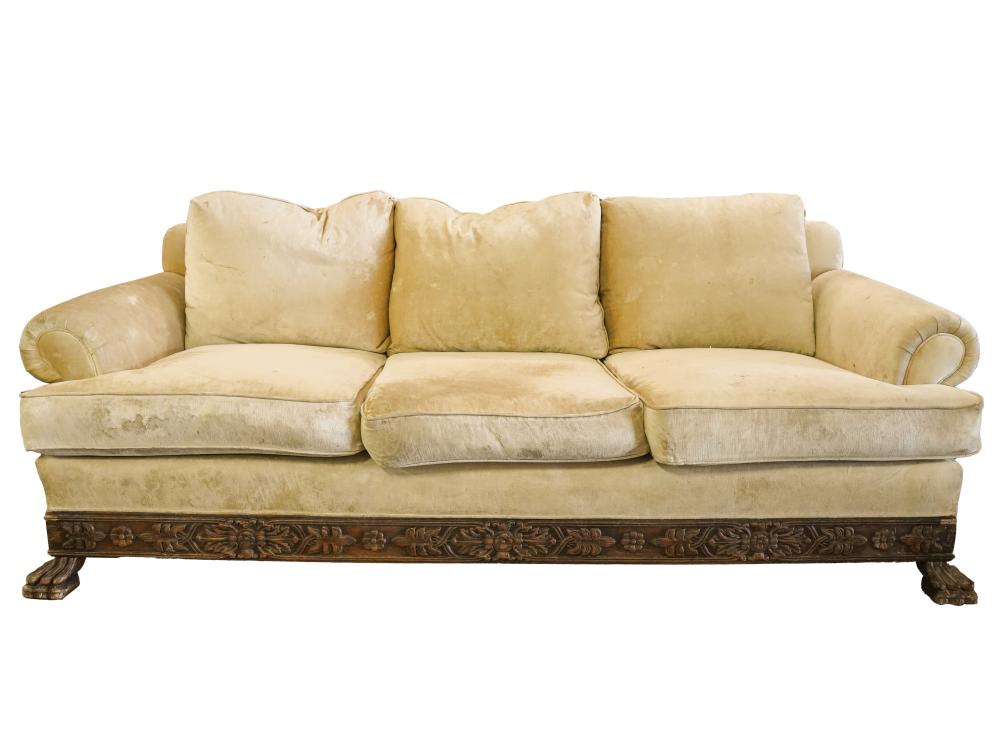 Appraisal: CARVED WOOD SOFAwith beige upholstery Condition multiple stains and areas