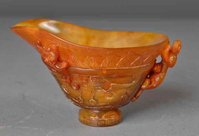 Appraisal: Chinese Horn Libation Cup with AnimalsNicely carved and polished horn