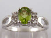 Appraisal: A carat white gold peridot ring the peridot approx x