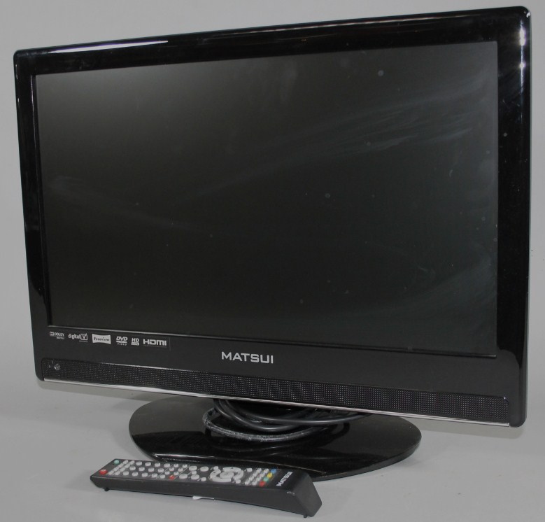 Appraisal: A Matsui colour television in black trim with remote control