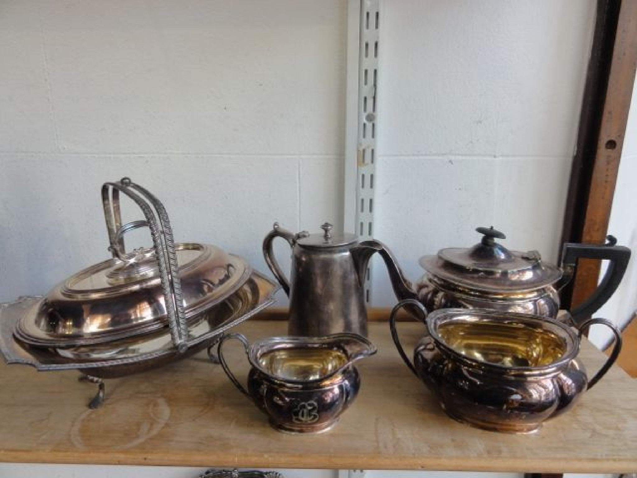 Appraisal: A three piece silver plated tea set comprising teapot two