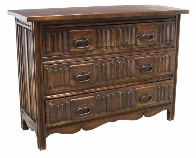 Appraisal: Continental Gothic style commode th c in a walnut finish