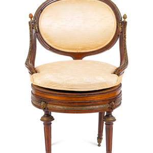 Appraisal: A Regency Style Gilt Metal Mounted Mahogany Swivel Chair TH