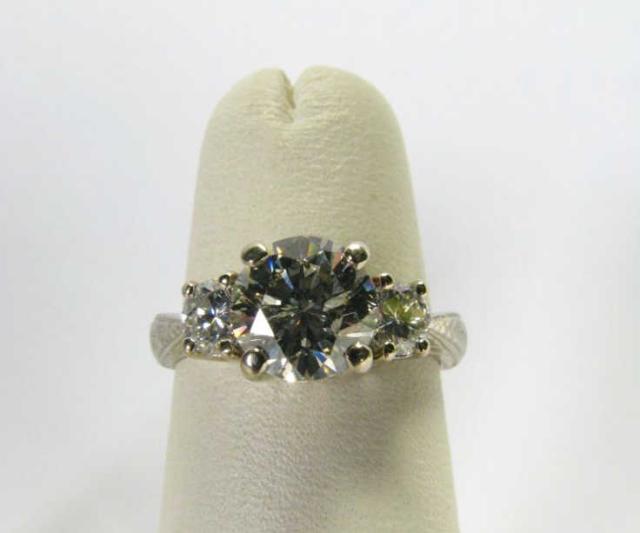 Appraisal: Lady's K White Gold engraved Ct Three Stone Diamond Engagement