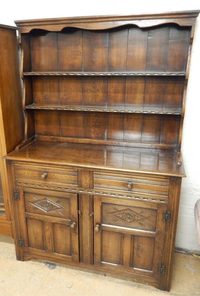 Appraisal: A Titchmarsh Goodwin oak dresser the raised back with two