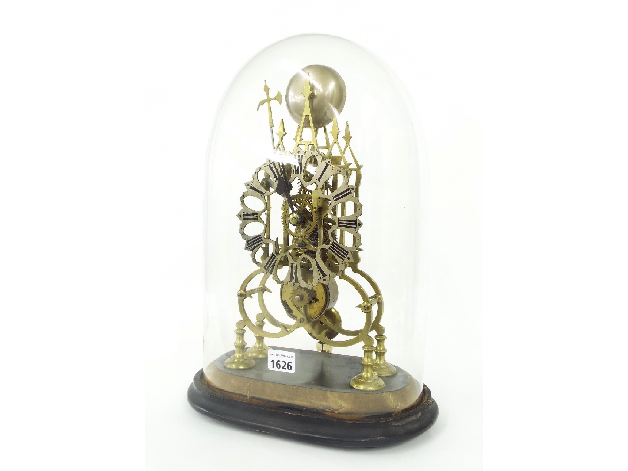 Appraisal: Brass single fusee Cathedral type skeleton clock striking on a