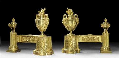 Appraisal: PAIR OF GILT BRONZE FIREPLACE CHENETS Louis XVI style Paris