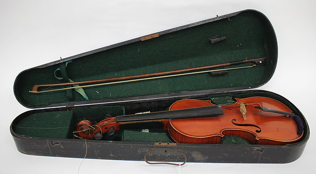 Appraisal: AN OLD RIVIERE HAWKES VIOLIN and bow in case bearing