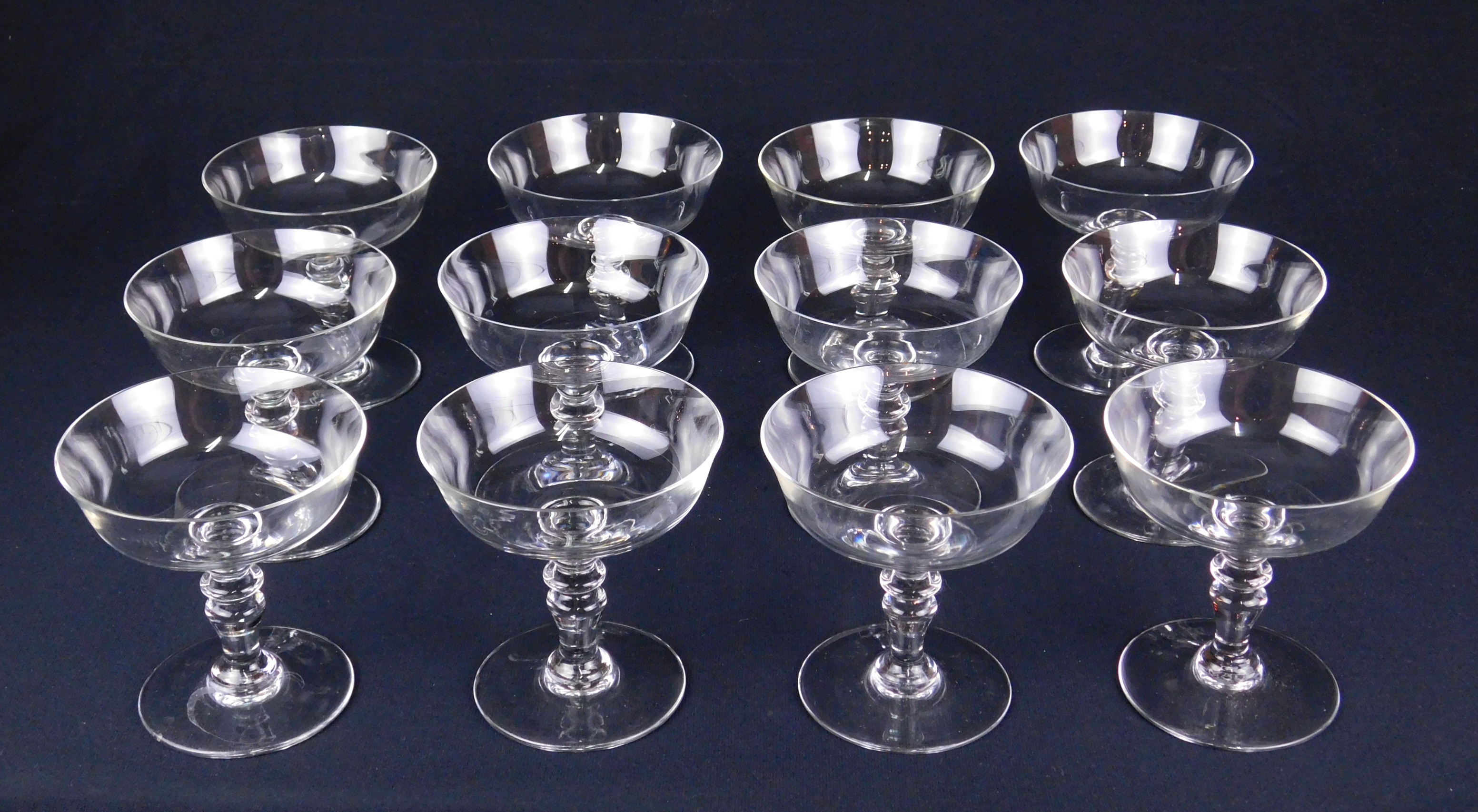 Appraisal: Set of Baccarat champagne coupe glasses each marked on bottom