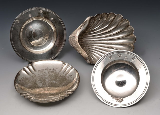 Appraisal: Two modern silver ashtraysof circular form together with a silver