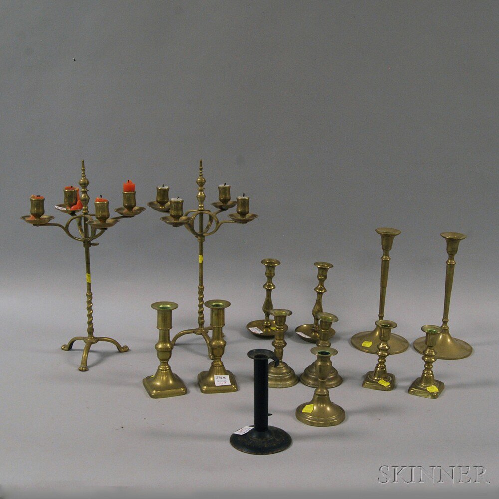 Appraisal: Fourteen Brass and Iron Candlesticks five pairs and one single