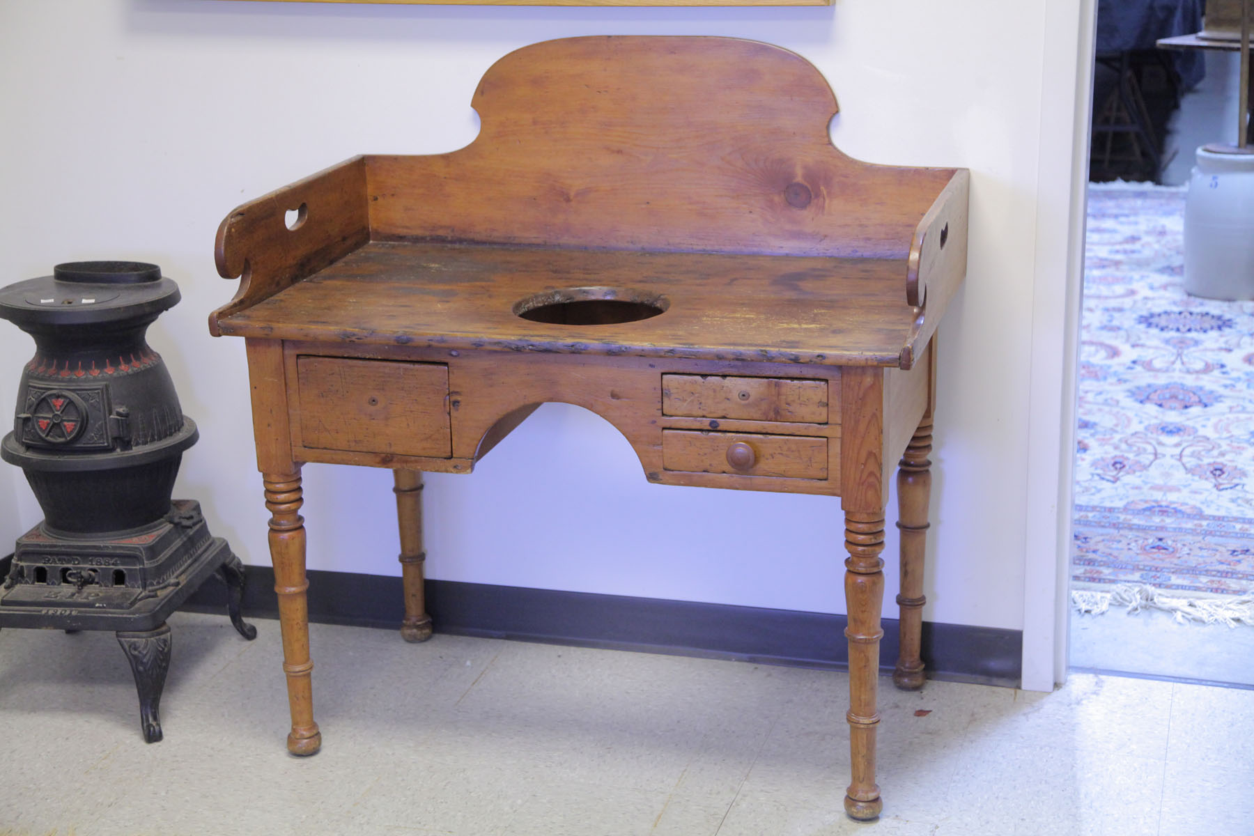 Appraisal: WASH STAND American mid th century Shaped and dovetailed gallery