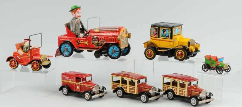 Appraisal: Lot of Tin Litho Old Timer Toys Description Japanese Working