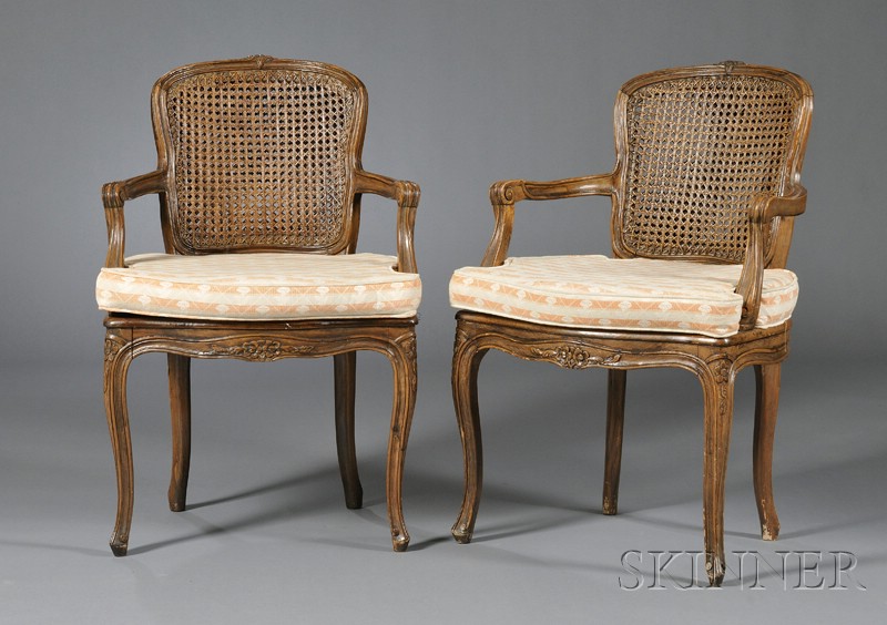 Appraisal: Pair of Louis XV Style Beechwood and Caned Open Armchairs