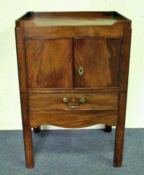 Appraisal: A George III mahogany tray top commode with brass carrying