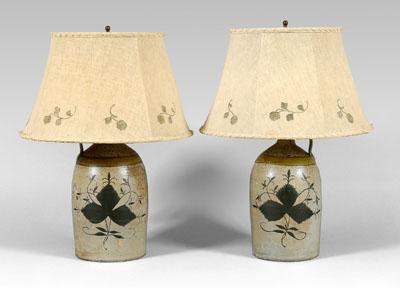 Appraisal: Pair stoneware jugs painted shades each with stamped signature quot