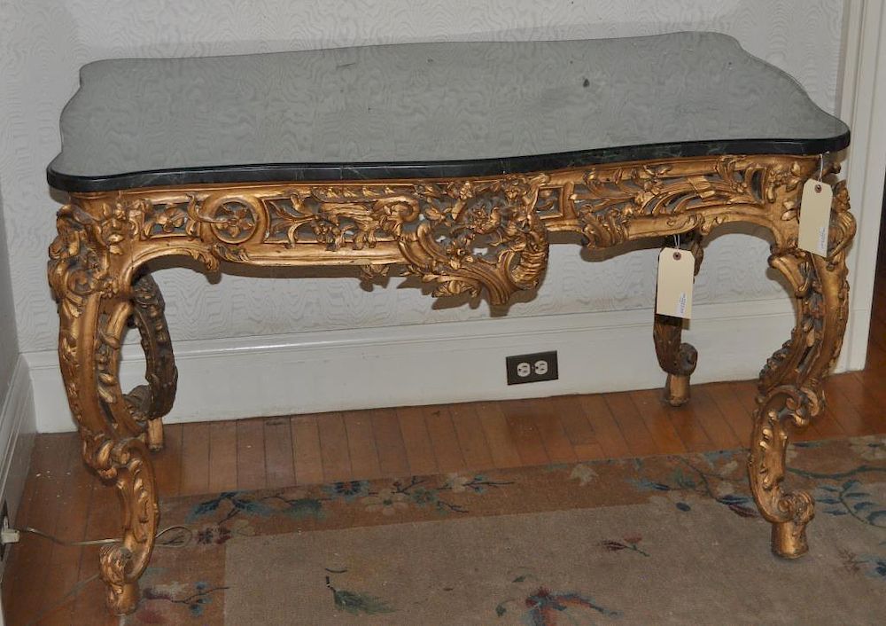 Appraisal: Continental Baroque Carved Gilded Console Table with elaborate carved details