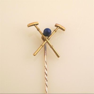 Appraisal: Of Polo interest A gold stick pin with two Polo