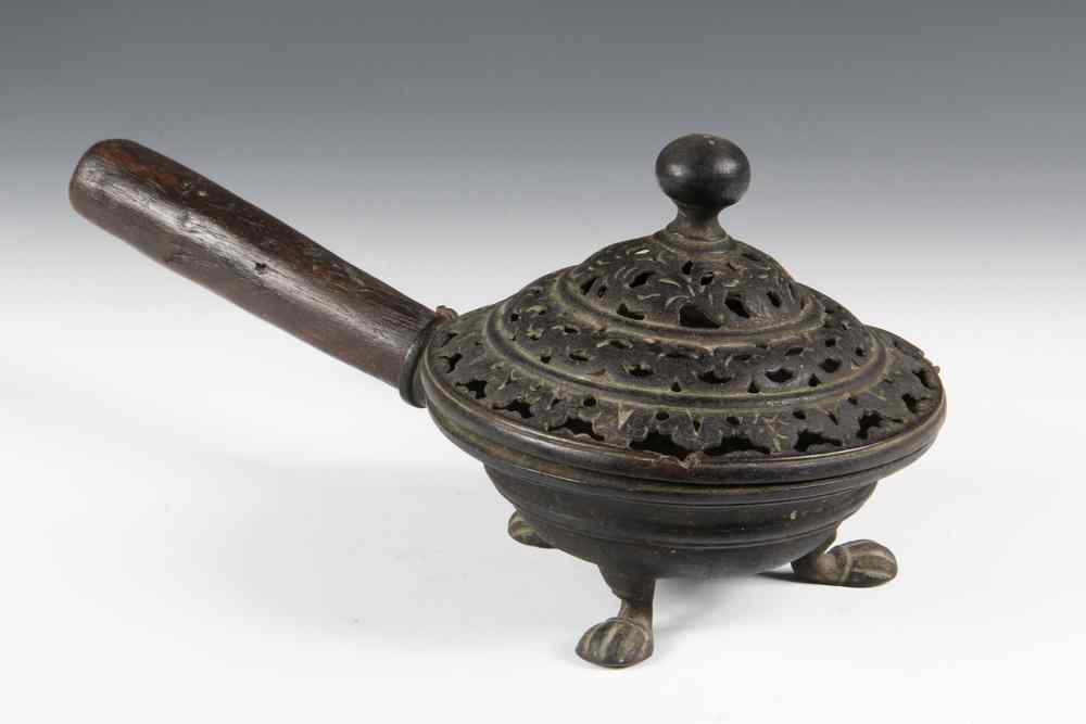 Appraisal: TH CENTURY PERSIAN BRONZE TRIPOD CENSER - With wooden handle