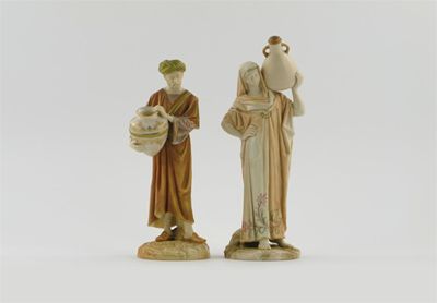 Appraisal: Two Royal Worcester figures of water carriers gilded on a