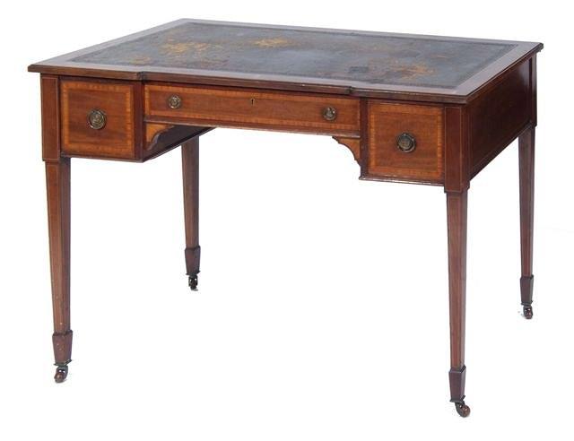 Appraisal: An Edwardian mahogany writing table with satinwood banding and square