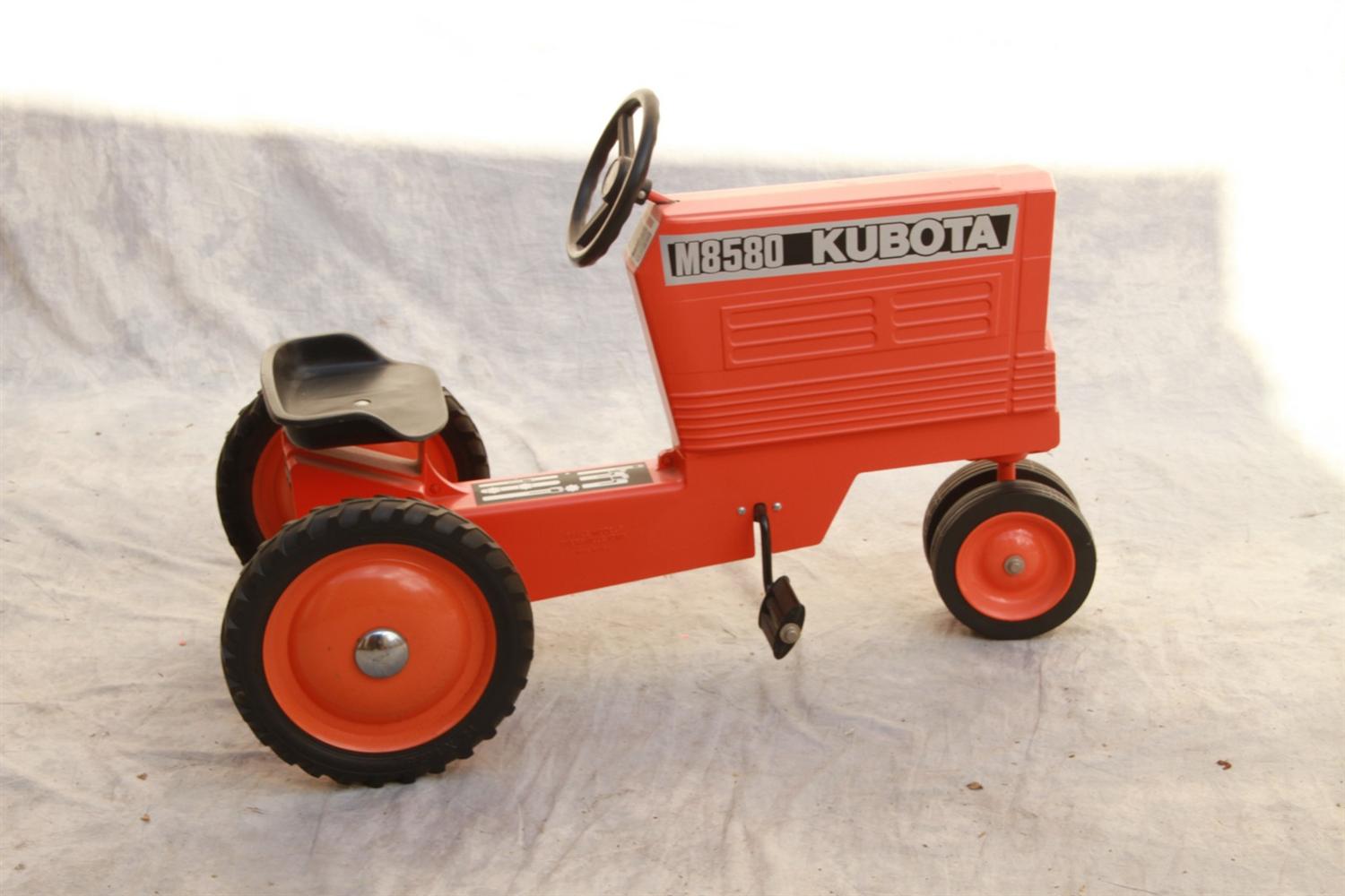 Appraisal: Kubota M pedal car tractor orange and black h x