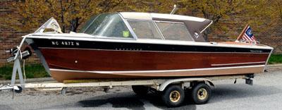 Appraisal: Century Coronado runabout boat wooden hull probably mahogany General Motors