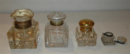 Appraisal: Four Metal Mounted Glass Ink Bottles Estimate nbsp nbsp nbsp