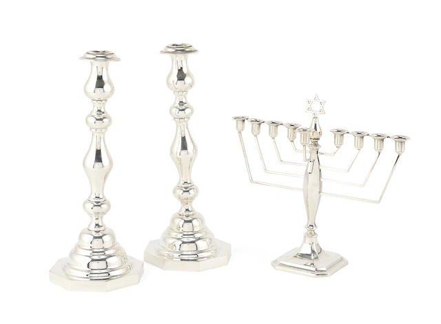 Appraisal: A pair of silver sabbath candlesticks by A Taite Sons