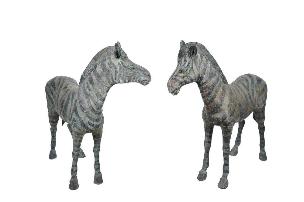 Appraisal: PAIR OF MALE FEMALE BRONZE ZEBRASeach inches wide inches high