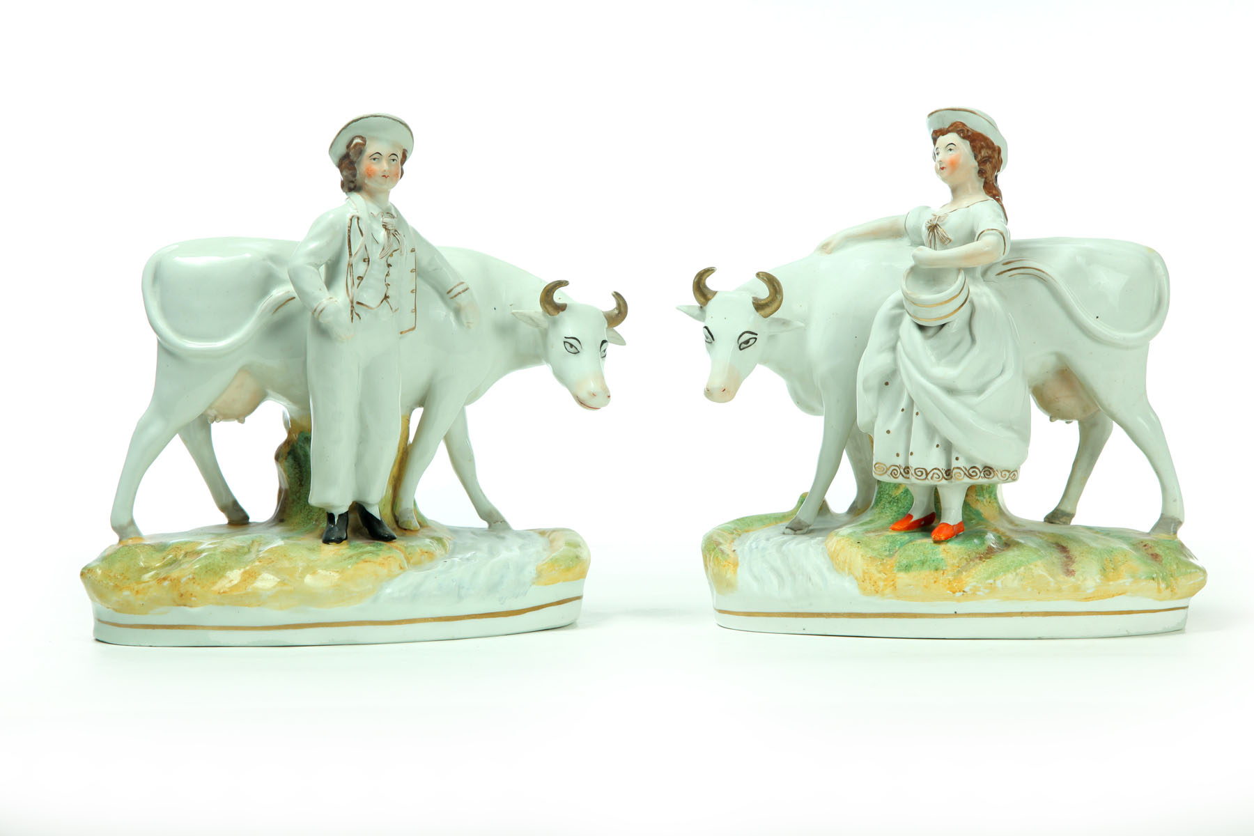 Appraisal: PAIR OF STAFFORDSHIRE COWS England nd half- th century Two