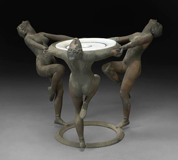 Appraisal: A bronze center table The circular top supported by three