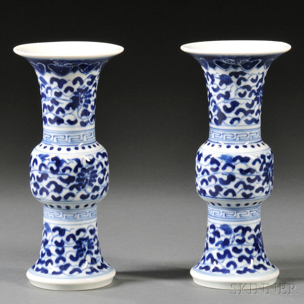 Appraisal: Pair of Blue and White Gu-shape Vases China resting on