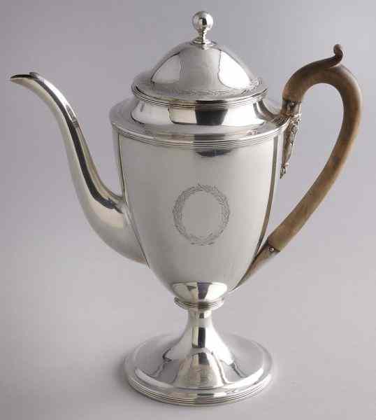 Appraisal: George III sterling silver teapot the lid with engraved foliate