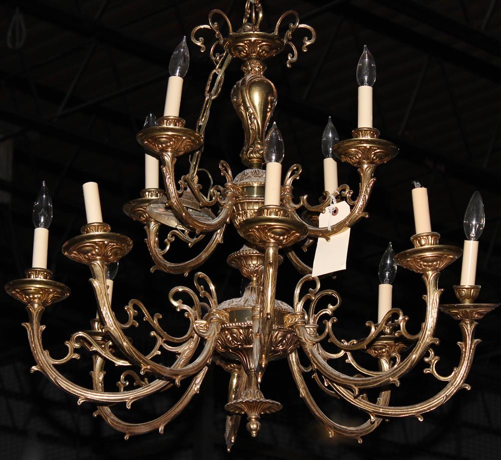 Appraisal: DUTCH STYLE BRASS TWO TIER CHANDELIER having twelve lights with