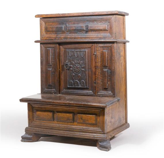 Appraisal: KNEELER Baroque Carved walnut Hinged cover with compartment Iron fittings