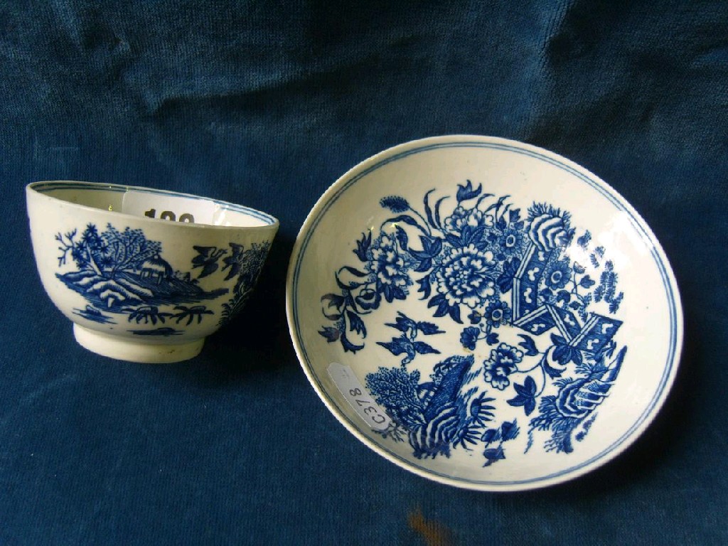 Appraisal: A Worcester tea bowl and saucer with chinoiserie garden and